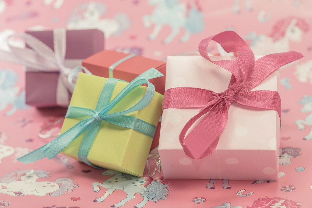 A pile of colorful wrapped gift boxes